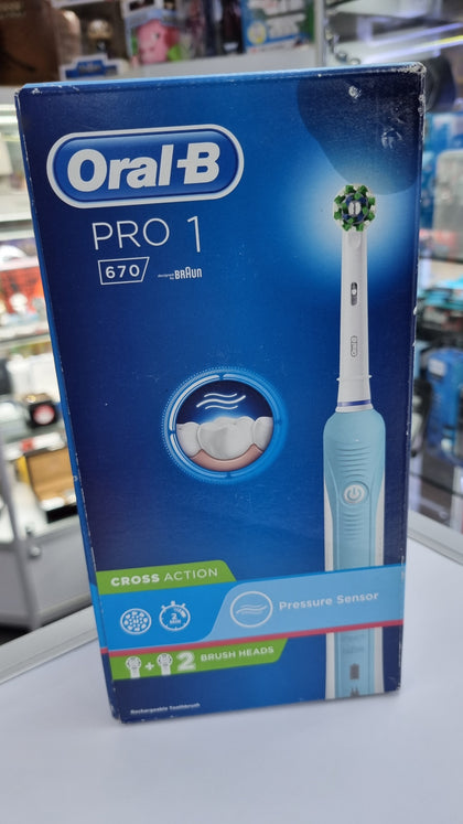 Oral B Pro 1 670 Electric Toothbrush.