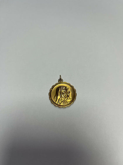 9ct gold virgin mary pendant.