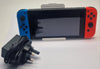 Nintendo Switch With Neon Blue And Neon Red Joycon