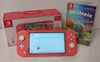 *Sale* Nintendo Switch Lite - Coral & 1 Game