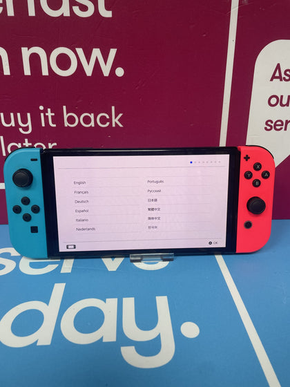 NINTENDO SWITCH OLED BLACK WITH NEON JOY CONS UNBOXED.