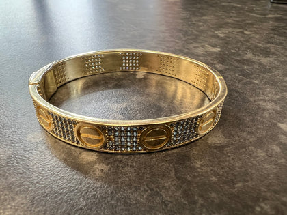 9CT GOLD BANGLE 17.31 GRAMS LEIGH STORE.