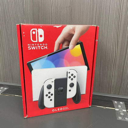 Nintendo Switch – OLED Model (White) with Charger & Dock.