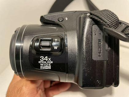 Nikon Coolpix 16MP (32gig MC).