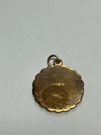 9ct gold virgin mary pendant.